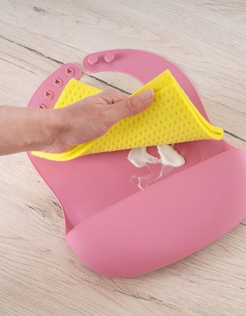 Bavetica din silicon moale cu buzunar colector pentru bebelusi, reglabila, roz, Reer Eat`n Tidy 25044